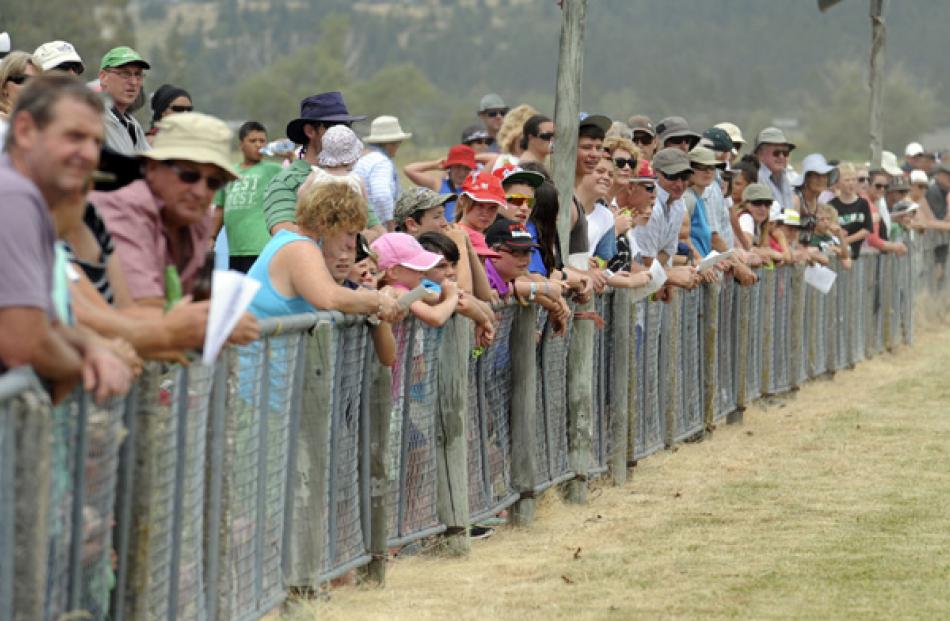 The crowd watches the Alan May Memorial Trot.