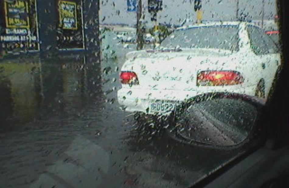 Nick sent this photo of flooding outside the Mad Butcher shop.