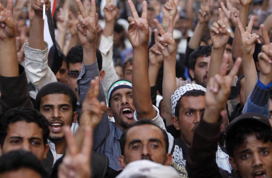 Yemeni pro-democracy protesters during a demonstration demanding that relatives of former...