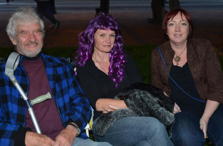 Dave and Fran Radley, and Kirsty Lewis-Bleakley, of Dunedin, sit in the Octagon watcing the...
