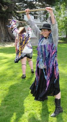 Jack Frost Morris Cub dancers Ana Clarke (left) and Helen Jones-Rippey perform. Photos by Craig...