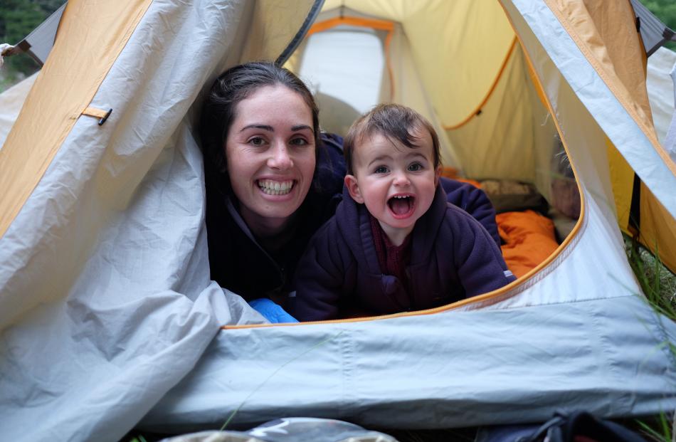 Lucy Sise (13 months) enjoys her first night camping with mum Georgie Sise on the Otago Central...
