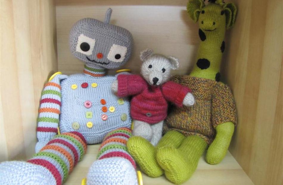 Chip the Robot, in 8-ply merino, Clyde Bear, in possum, and Giraffe in 4-ply merino are examples...