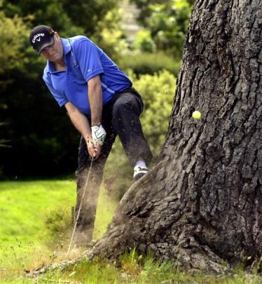 A tree was no barrier for Prime Minister John Key during his golf match at Balmacewen golf course...