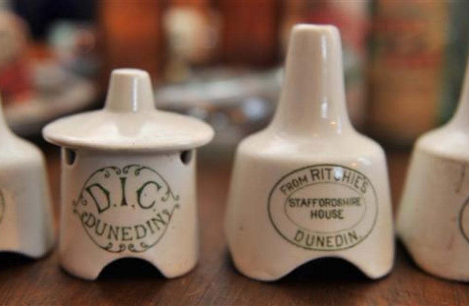 Four ceramic pie steamers from early Dunedin businesses are among Russell Knowles' collection.