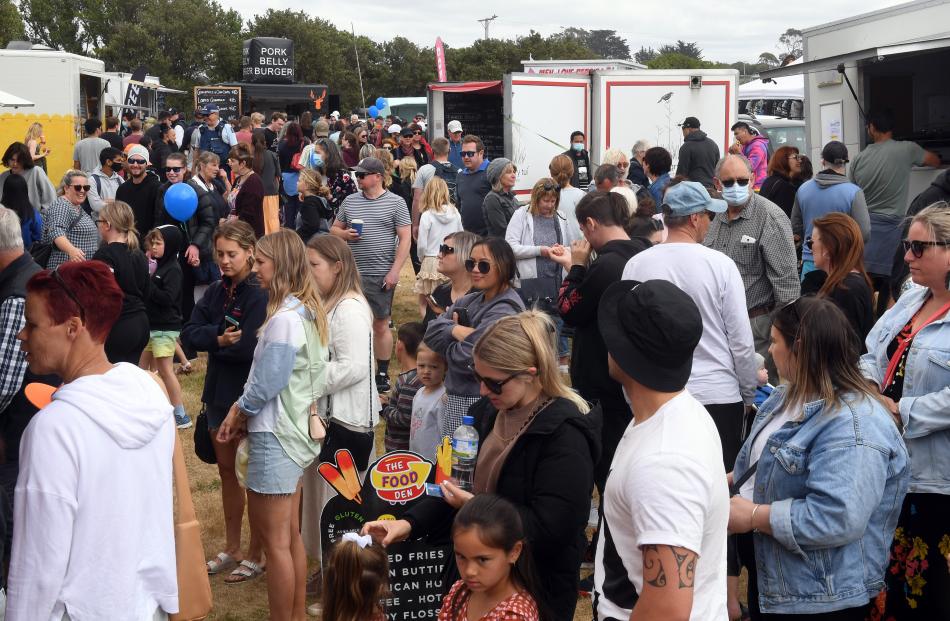 People queue for food at the Brighton Gala Day.