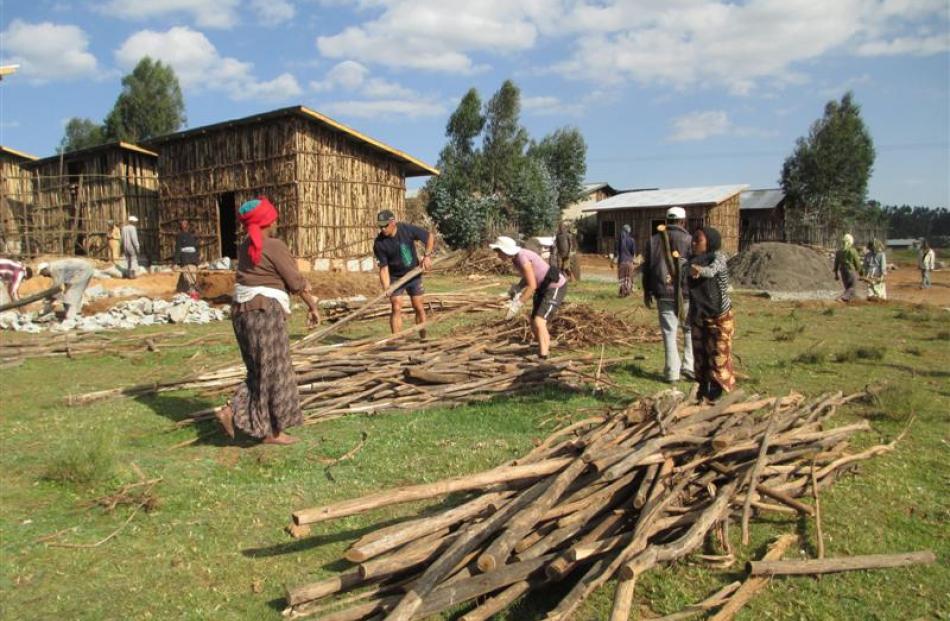 All hands to tidying up the work site.