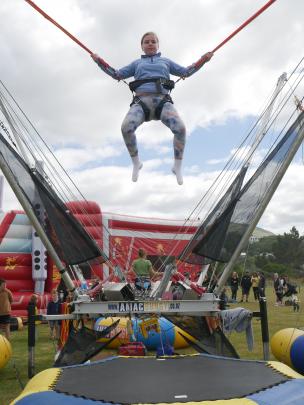 Stella Ross (11), of Dunedin, gets some air on the bungy.