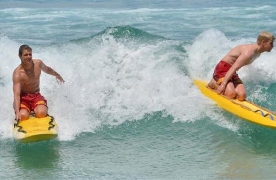 St Clair Surf Life Saving Club lifeguards Angus MacKenzie (left) and Andrew Trembath enjoy  the...