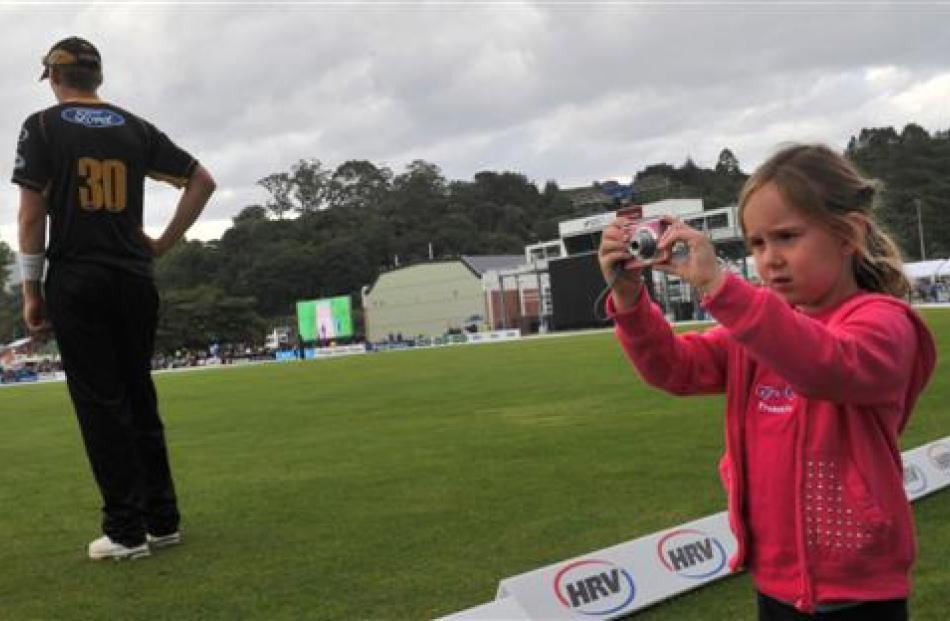 Maddi McBride (5), of Dunedin, captures the moment beside Wellington cricketer Harry Boam.