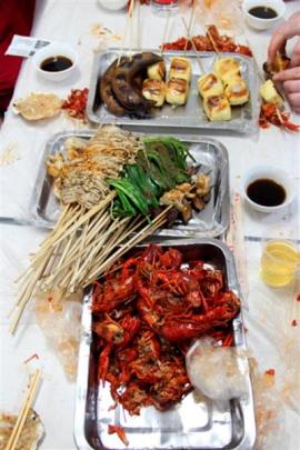 Crawfish and a selection of other Chinese food at the start of a new crawfish season.