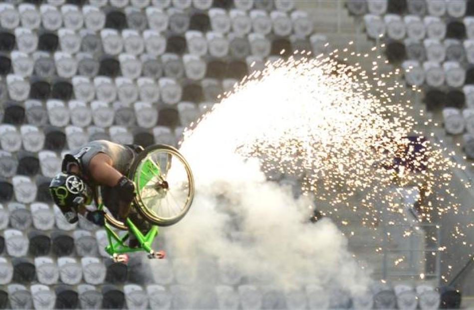 Aaron 'Wheelz' Fotheringham attempts a front flip in his wheelchair.
