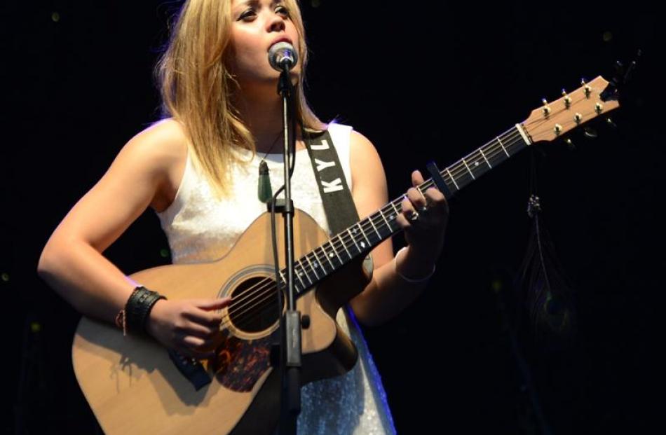 Singer-songwriter Kylie Price performs at the Hollies concert at  Forsyth Barr Stadium last night...