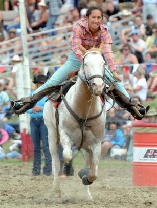 Cheyanne Church, of Rotorua, competes in the open barrel race.