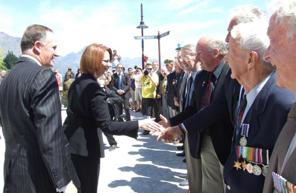 Both Prime Ministers shook hands with the returned services and war veterans at Queenstown's war...