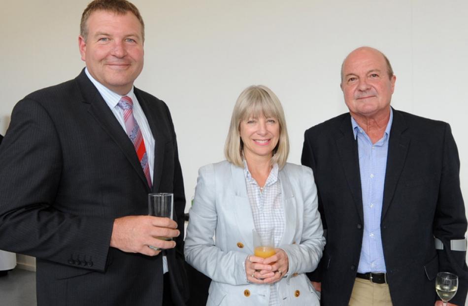 Otago Daily Times Editor Murray Kirkness, with Ann and John Scandrett.