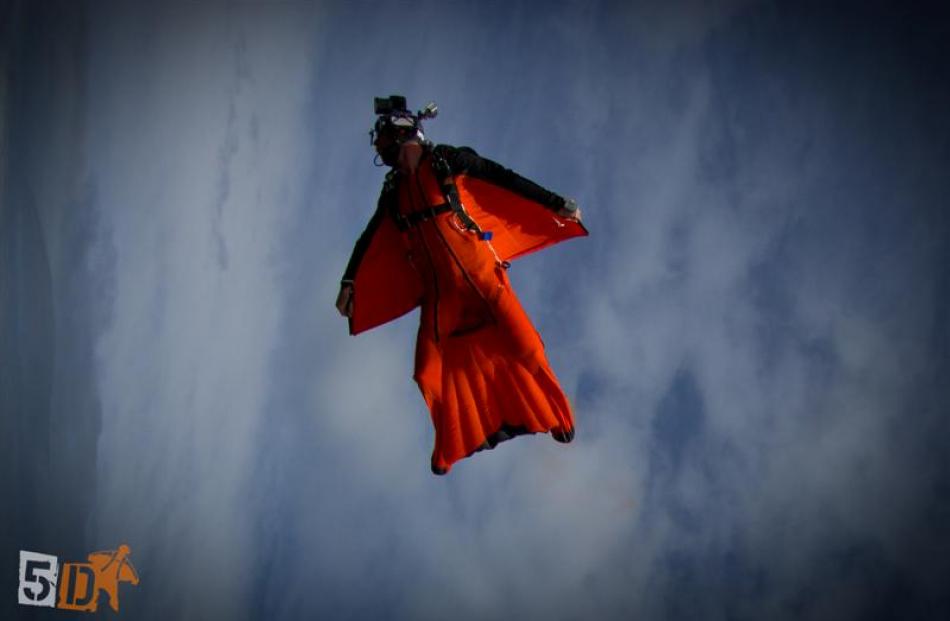 Mr Aitchison during a wingsuit flight over Pudding Hill, Methven; and while being filmed by...