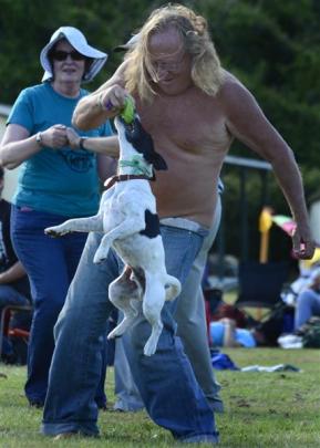 Michael Appleby, of Wellington, plays with Mate the fox terrier. Photos by Peter McIntosh.