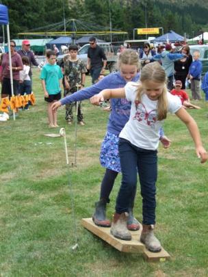 Neleah Manderson  (9, front) and Annabelle Toms (8),  of Roxburgh, teamed  for the agri-sports ...