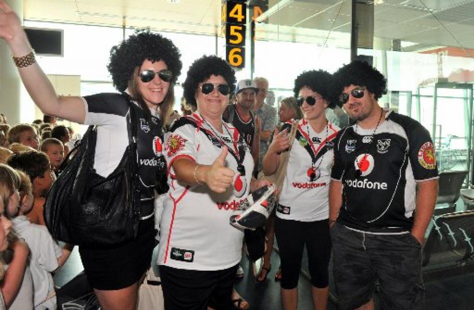 Warriors supporters (from left) Rachel Kemp (26), Jenna Heron (26), Maria Dudley (25) and Anthony...