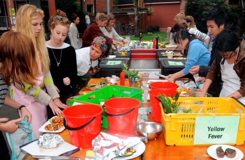 Competitors rush to complete their dishes in the Otago Farmers Market Masterchef Competition...