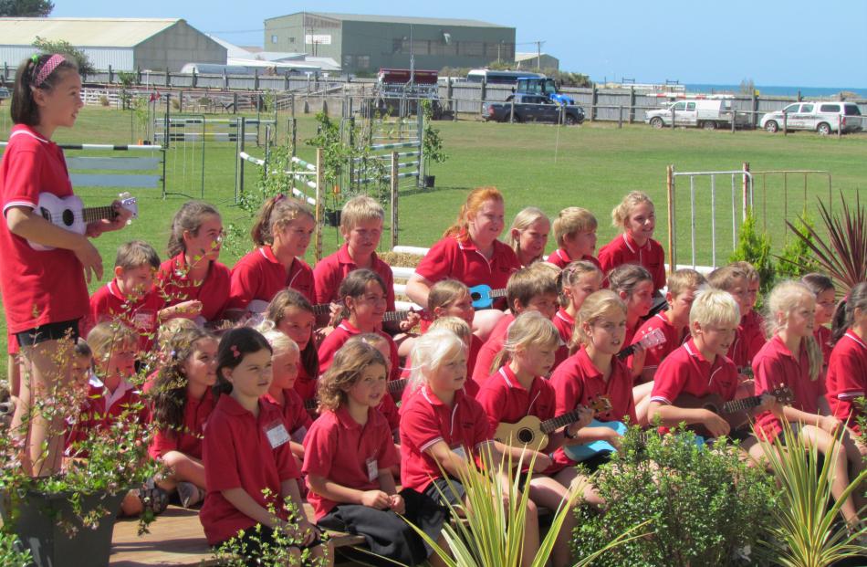 Pupils from Five Forks School provide a musical treat for Governor-General Sir Jerry Mateparae....