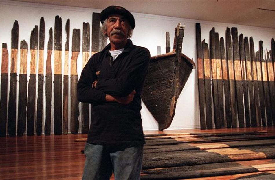 Ralph Hotere with his Black Phoenix installation at the Dunedin Public Art Gallery in 2000. Photo...