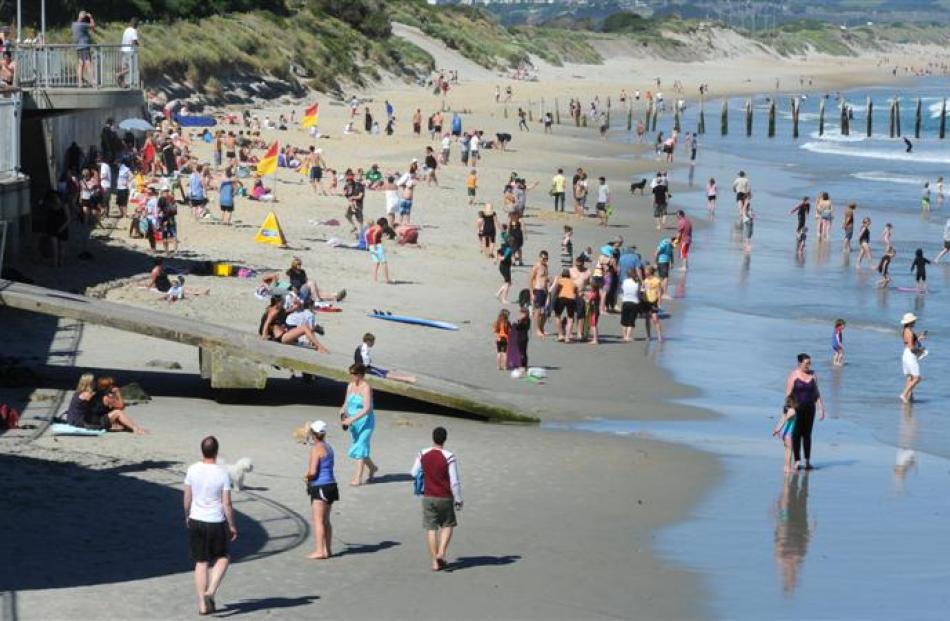 St Clair Beach was a very popular place to spend Christmas Day. Photo by Craig Baxter.