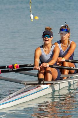 The St Hilda’s Collegiate duo of Maggie Dowling and Olivia Ollerenshaw empty the tank in the...