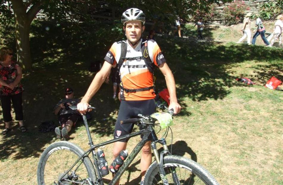 The winner of the Motatapu mountain bike men's elite race, Dirk Peters, of Rotorua, after the...