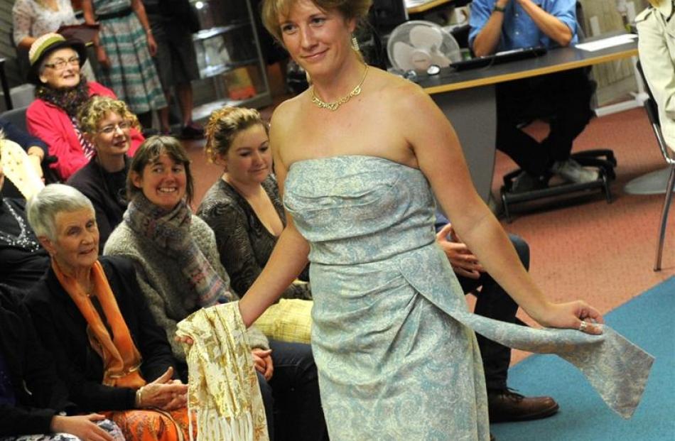 librarian Shana Clyne shows off her strapless gown.