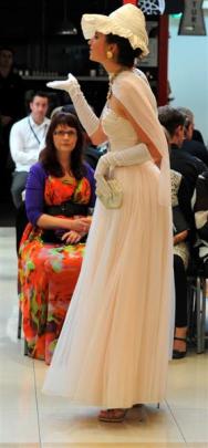 Annilise Dobbinson, of Dunedin, sashays around fashion fans.