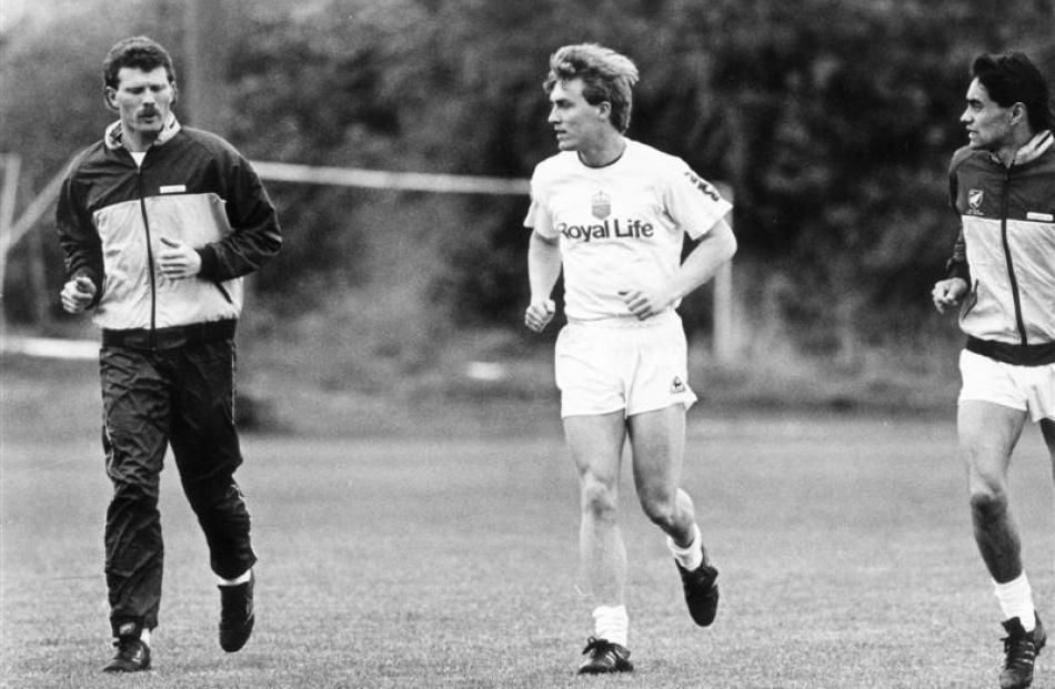 All Whites (from left) Ricki Herbert, Mike McGarry and Richard Mulligan head out for a jog at...