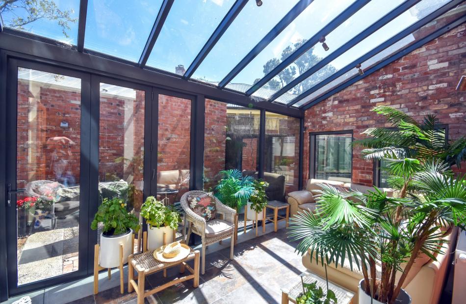 The conservatory is home to all sorts of greenery, including tomato plants. PHOTOS: WAYNE MAGEE