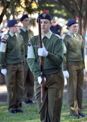 Flynn McCormick (15), of Dunedin, during the Anzac service at Memorial Park. PHOTO: PETER MCINTOSH