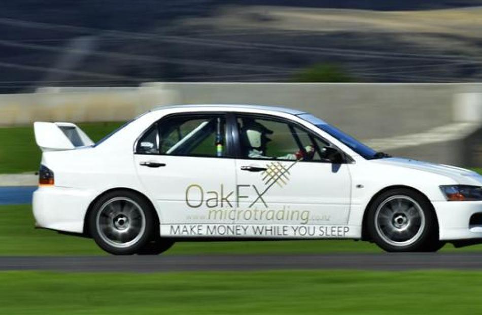 Driver Grant Aitken, of Queenstown, and Sarah Marquet are ready for some fast laps of  Highlands...