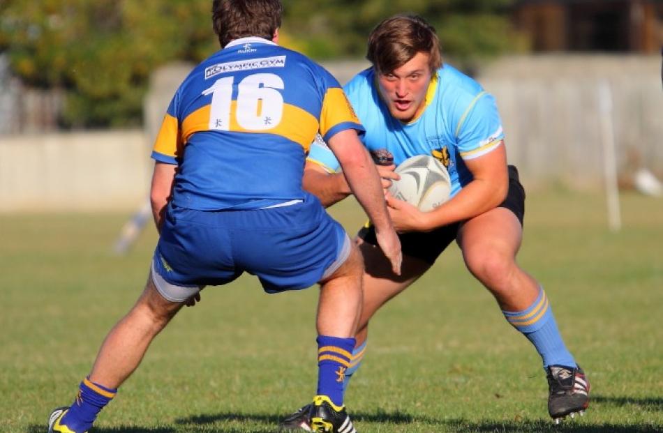 University and Taieri players face off as their sides clashed at Peter Johnstone Park.