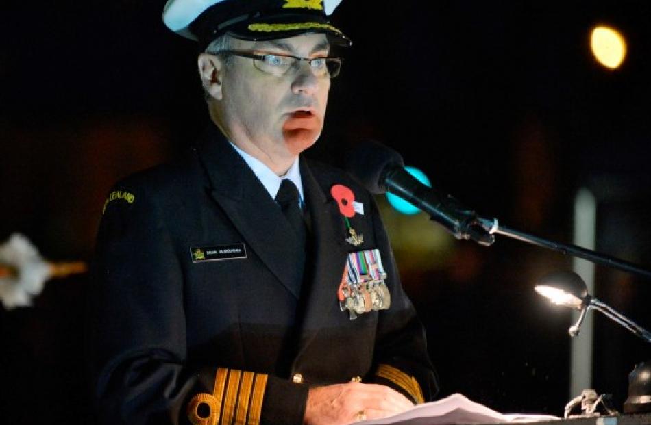 Captain Dean McDougall gives his address.