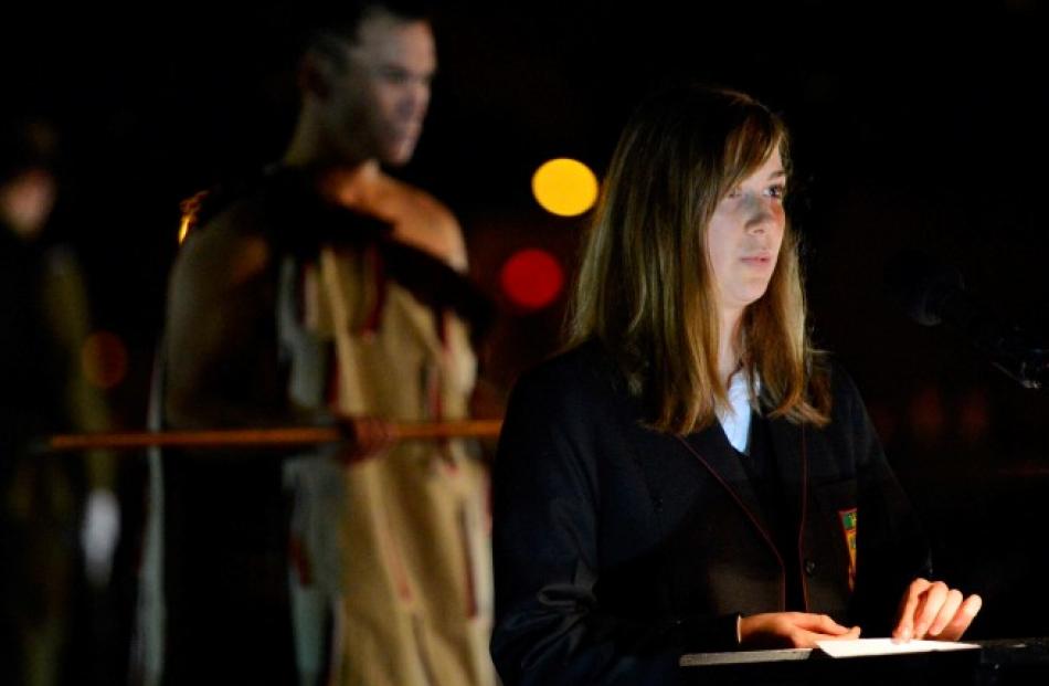 Logan Park High School head prefect Polly Kennedy reads the lesson at the Dawn Parade.