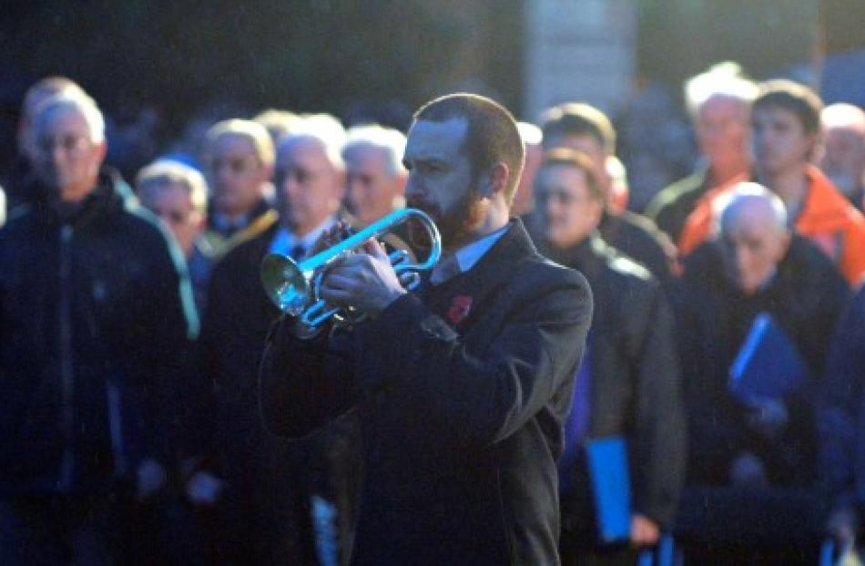 Ralph Miller plays the Last Post.