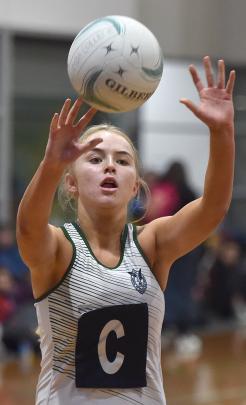 Columba College centre Riley Piebenga passes the ball in the senior A final at the Otago...