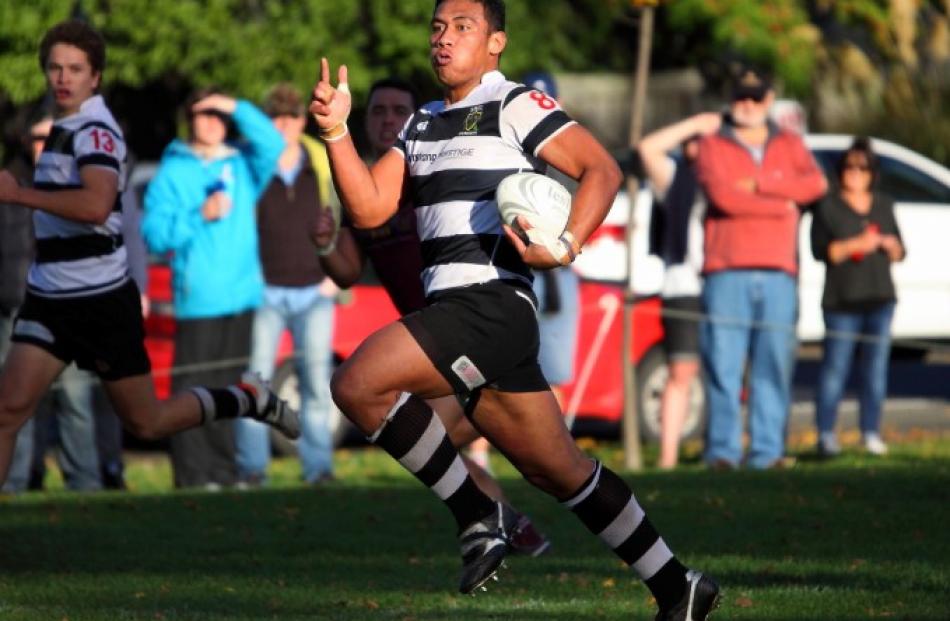 Southern No 8 Lafaele Faamoe strides out to the try line.