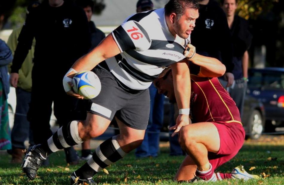 Warren Moffatt keeps the ball alive for the rest of the Southern forwards.