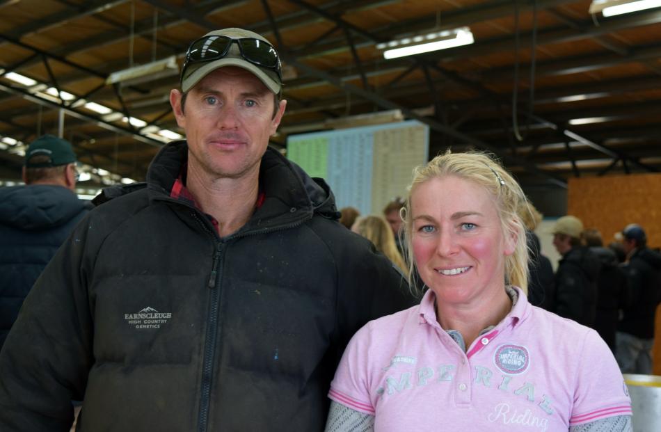 Earnscleugh Station owners Duncan and Amanda Campbell in their woolshed at their 37th annual bull...