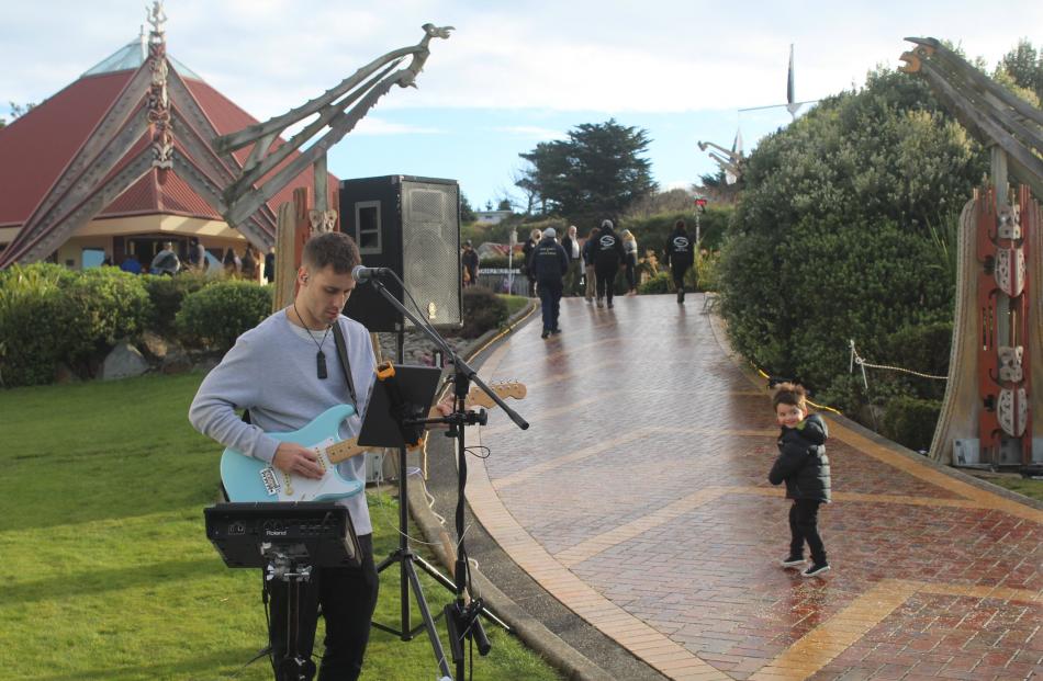 Musician Darcy Kerr (above) welcomed guests to Te Rau Aroha Marae in Bluff with a mix of local...