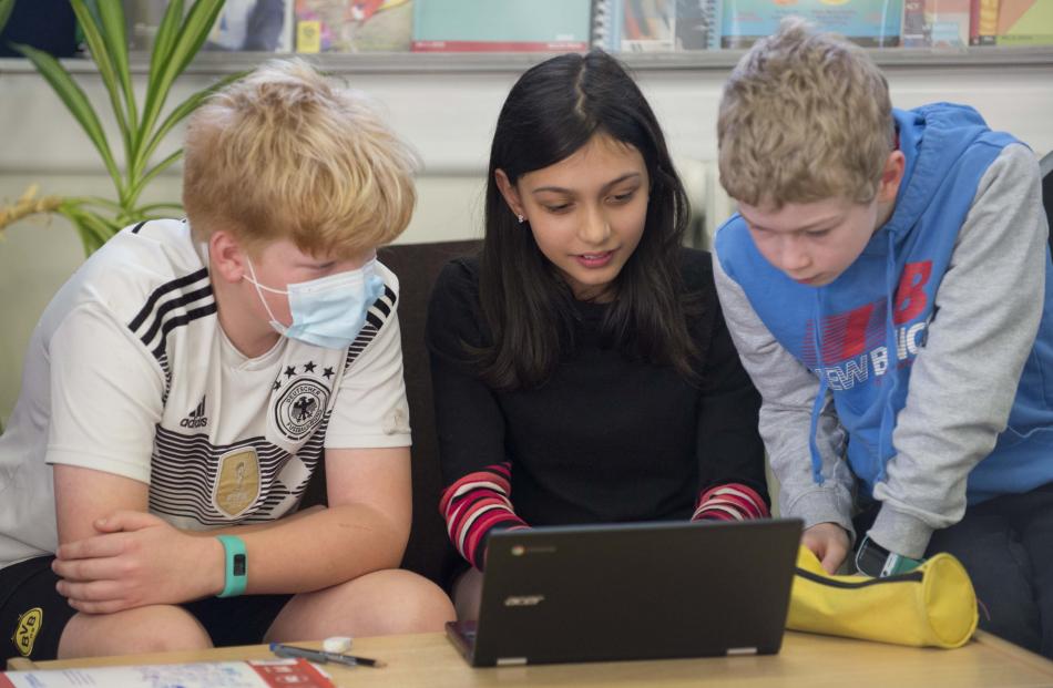 Timo Morrison (left, 10), Selah Bachur (11) and Alex O’Brien (10) are deep in thought.