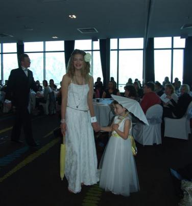 Leitesha Pentelow  (15) and flower girl Alessandra Fisk (5) model dresses.