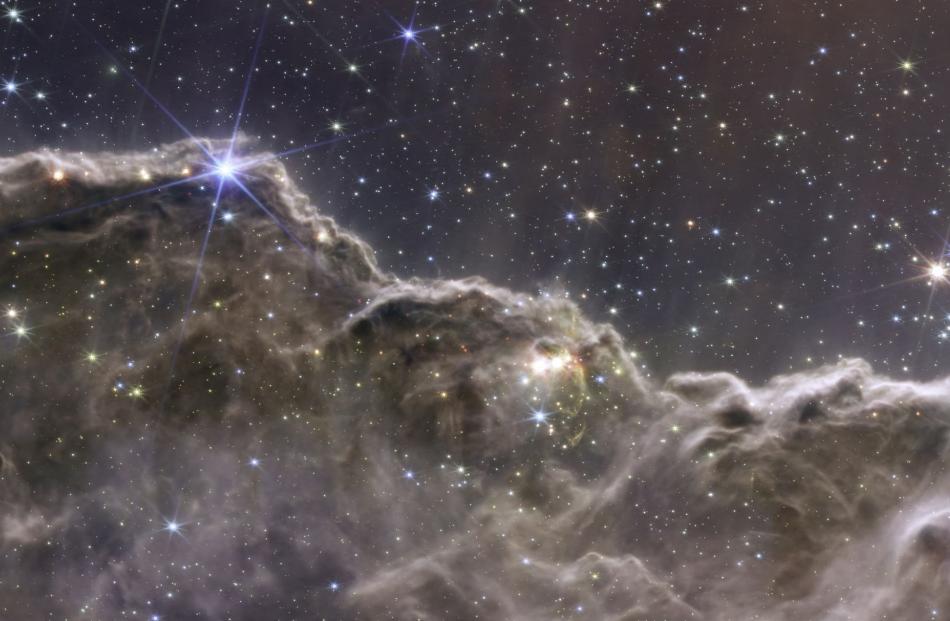 A composite image of the Cosmic Cliffs in the Carina Nebula. PHOTO: REUTERS
