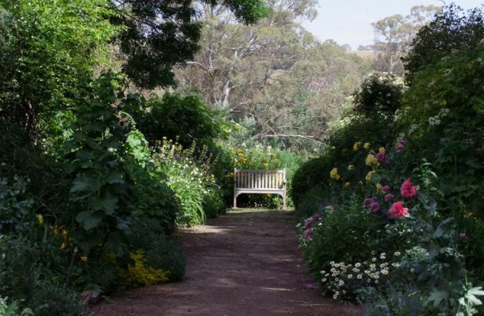 A seat at the end of an earth path.