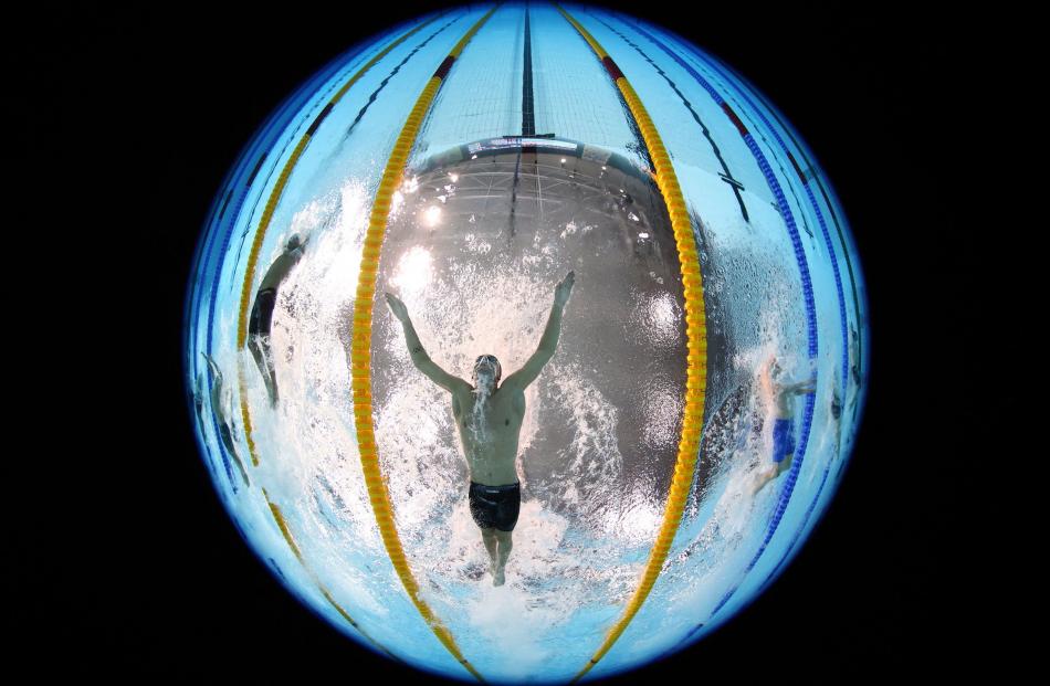 New Zealand swimming star Lewis Clareburt competes in the 200m butterfly final.